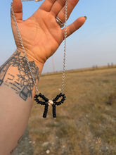 Load image into Gallery viewer, White Buffalo, Black Onyx Bow necklace
